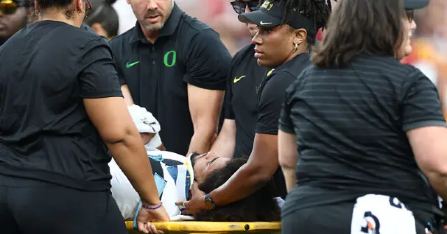 USC Defender Smiles After Illegal Hit Sends Oregon QB to Hospital