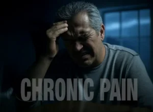 The image depicts a person in distress, with the text "CHRONIC PAIN" overlaid, suggesting the theme of chronic pain.
