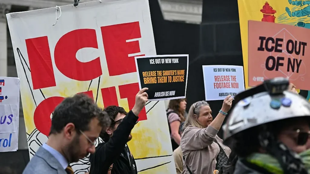 Protesters hold signs calling for the release of information and the abolition of ICE in New York City.
