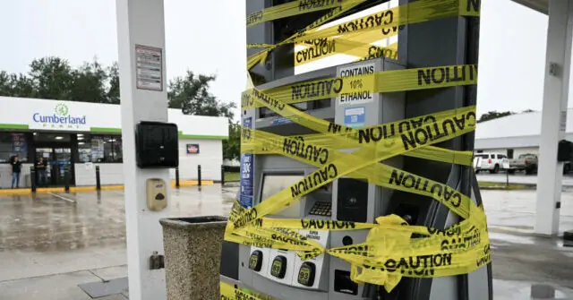 A Cumberland gas station is shown with a fuel pump covered in yellow caution tape, indicating restricted access or a safety precaution.