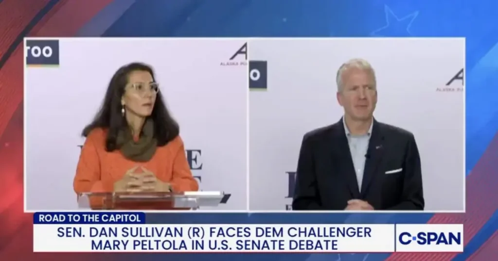 The image shows a U.S. Senate debate between Sen. Dan Sullivan (R) and Democratic challenger Mary Peltola, broadcast on C-SPAN.
