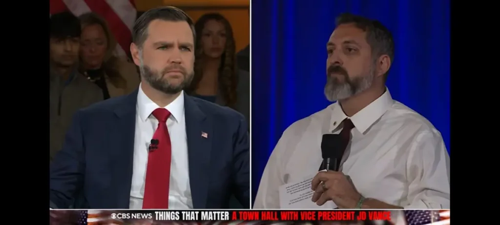 The image shows two individuals participating in a CBS News town hall event with Vice President JD Vance.