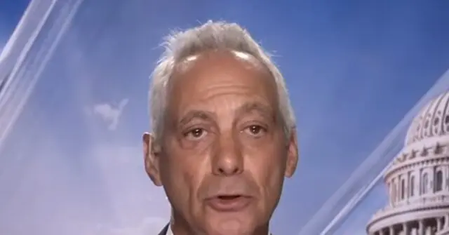 The news photo features a man speaking in front of a backdrop that includes a clear sky and a building resembling the U.S. Capitol.