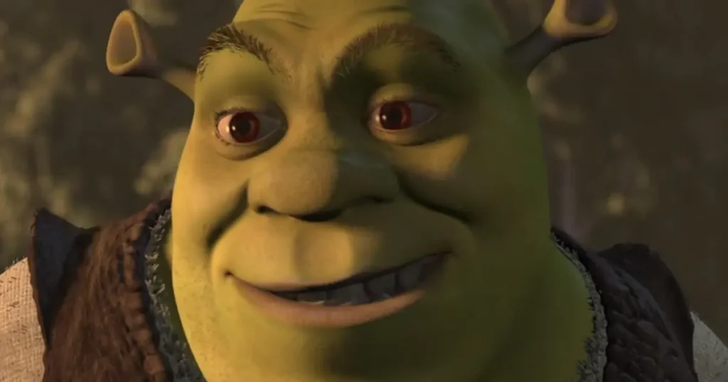 The image shows a close-up of a green, animated character with large ears and a friendly expression.