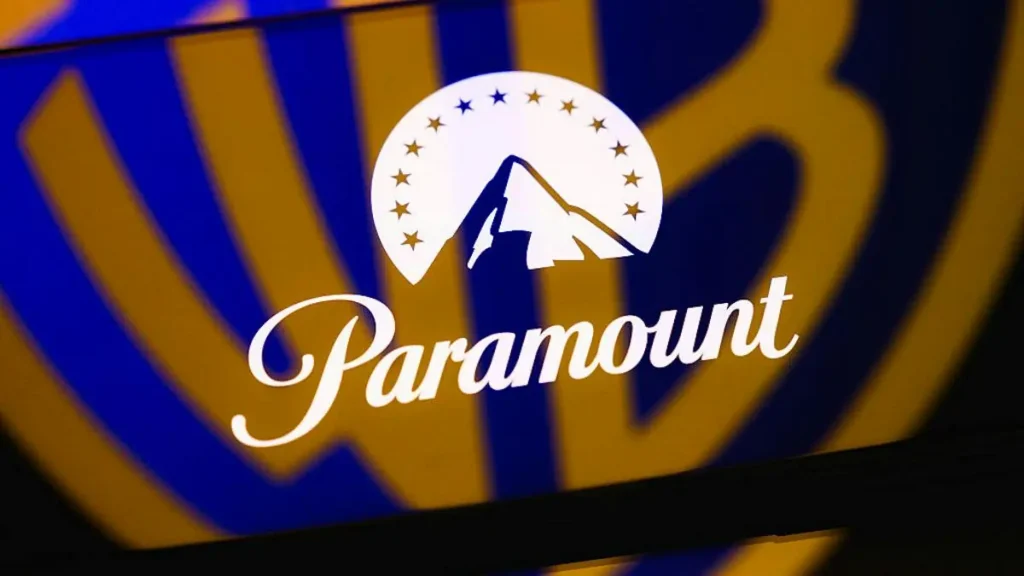 The image shows the Paramount logo with a mountain and stars design, set against a blue and yellow striped background.