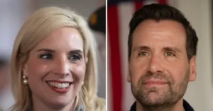 The news photo features two individuals, one smiling and the other with a neutral expression, set against a backdrop that includes an American flag.