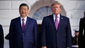 The photo shows two world leaders standing side by side in formal attire, likely during a diplomatic or official visit.